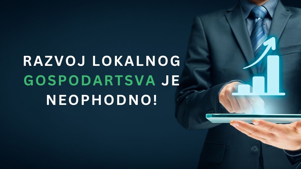 Lokalno gospodarstvo, poslovni čovjek drži laptop u rukama